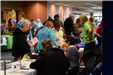 Visitors view displays at the Senior Expo