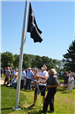 Veterans raise the flag