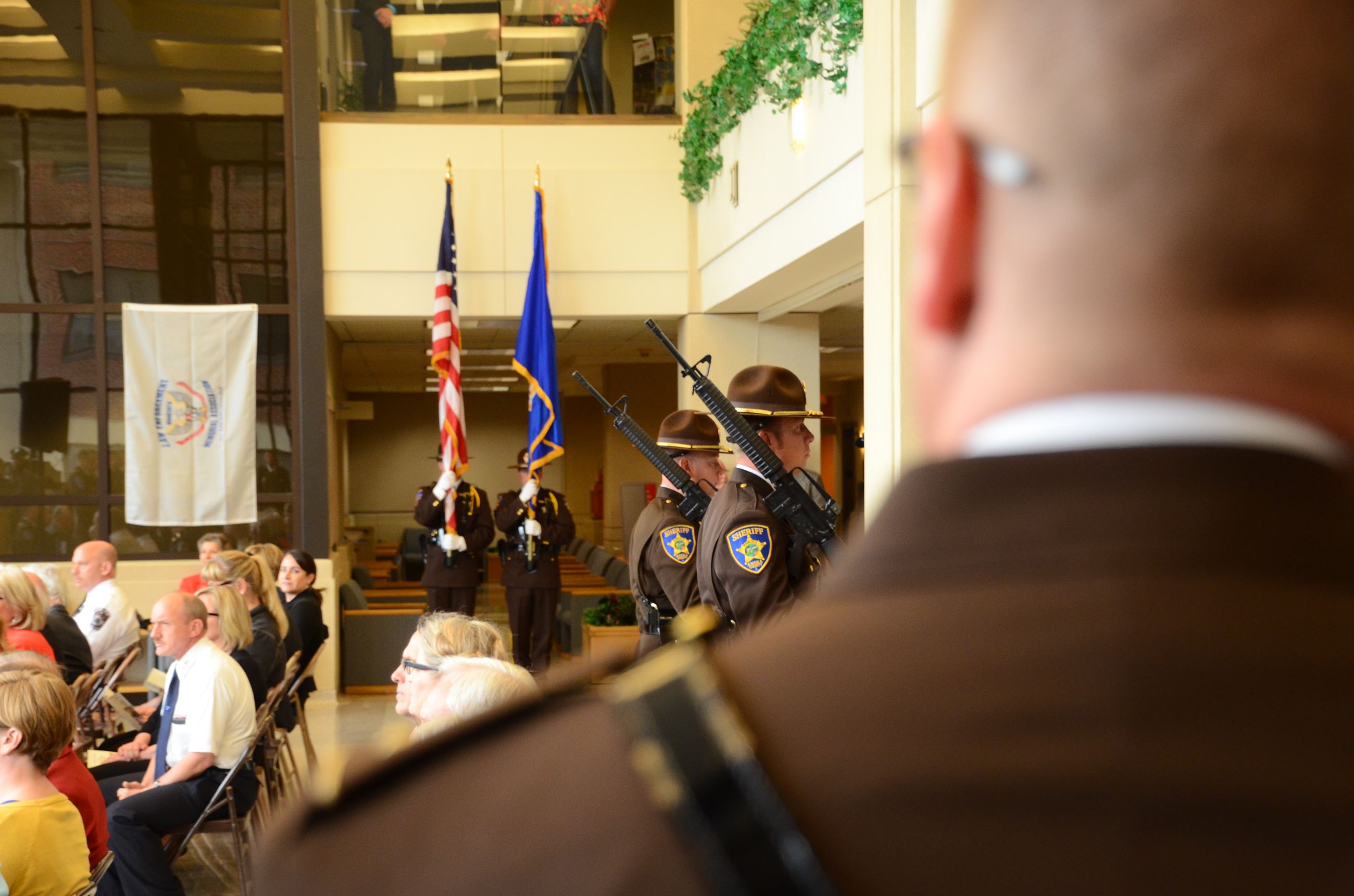 Honor guard presents flag