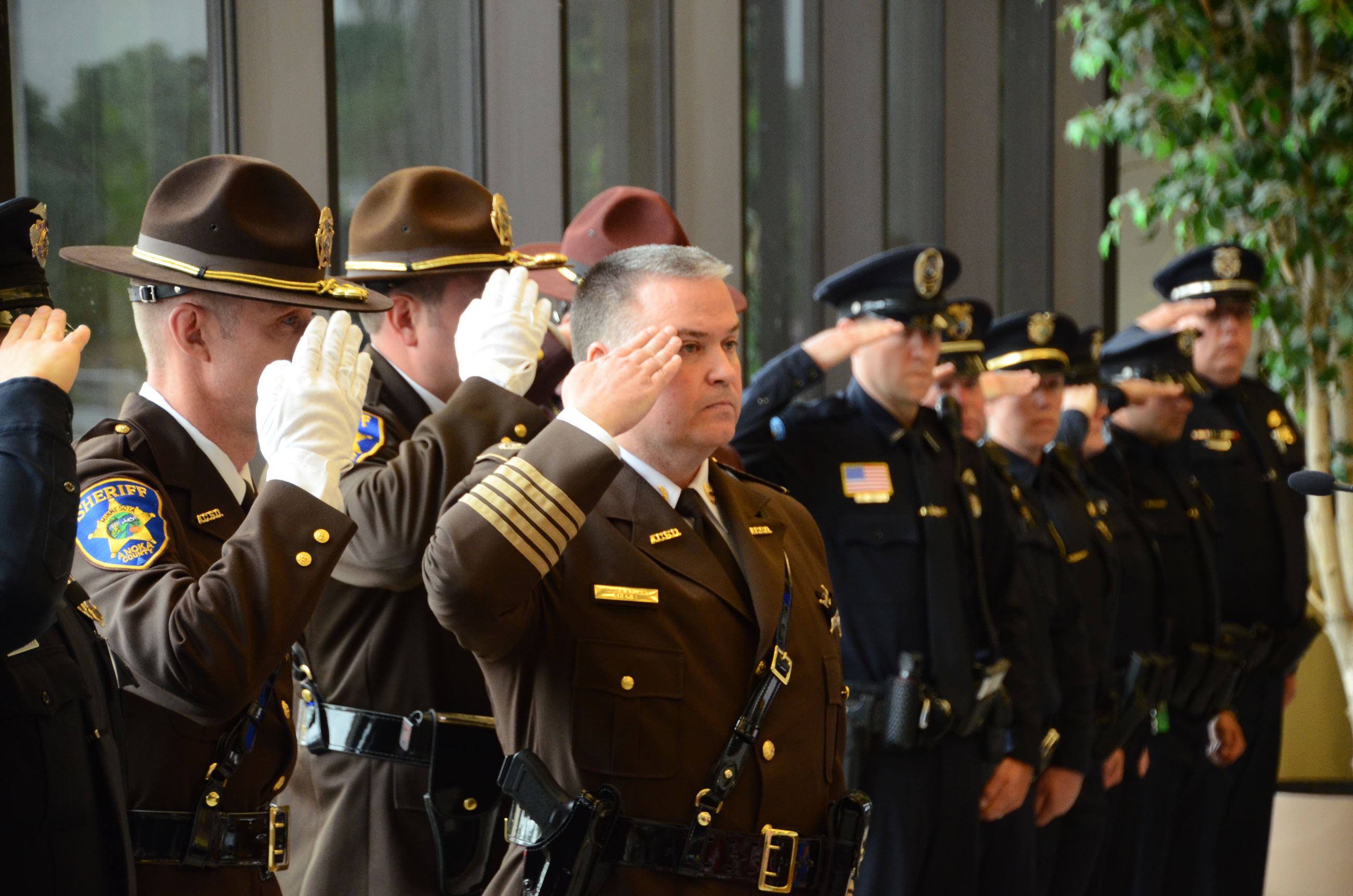 Officers stand at attention