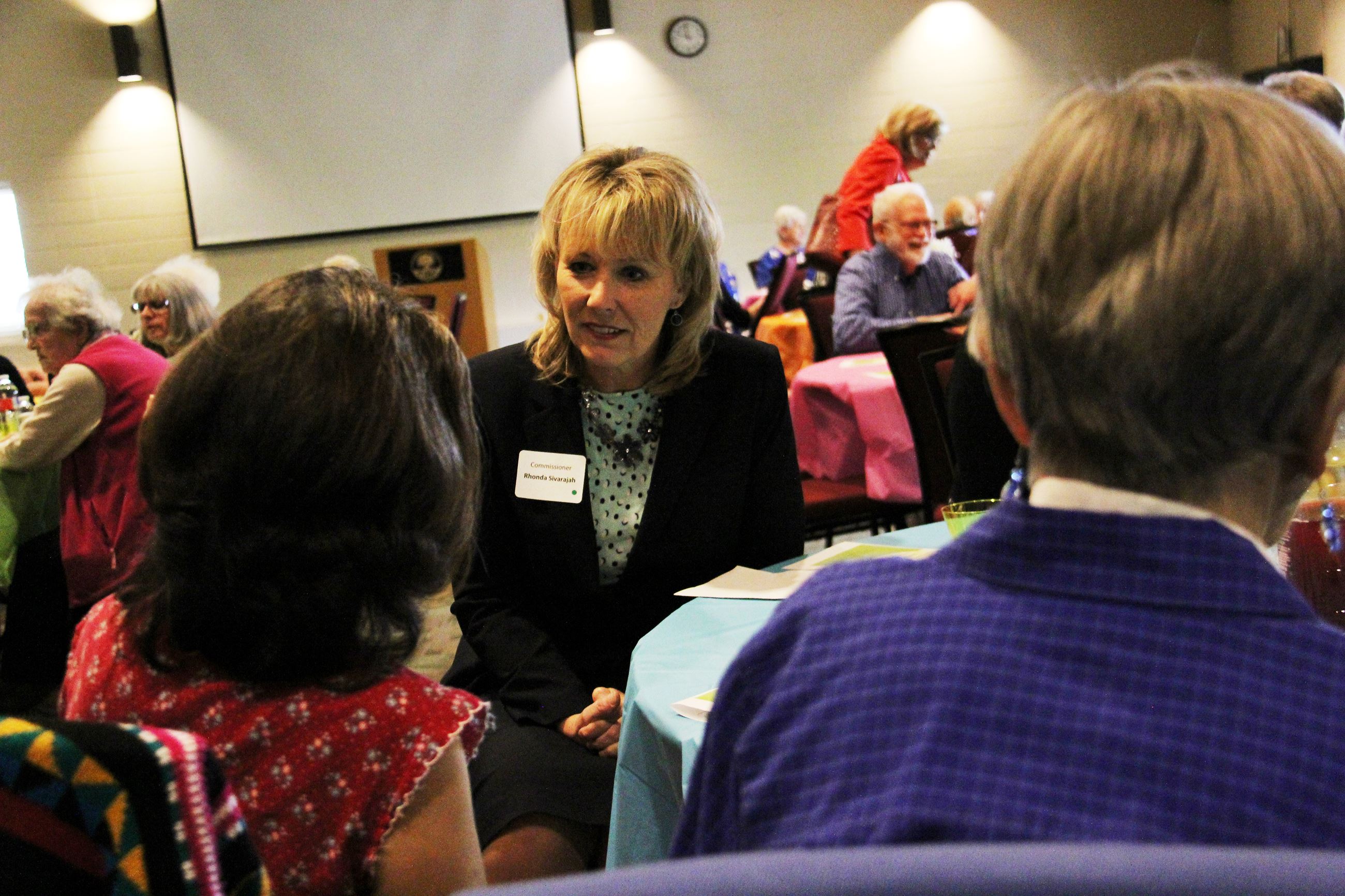 Commissioner Rhonda Sivarajah visits with RSVP event guests