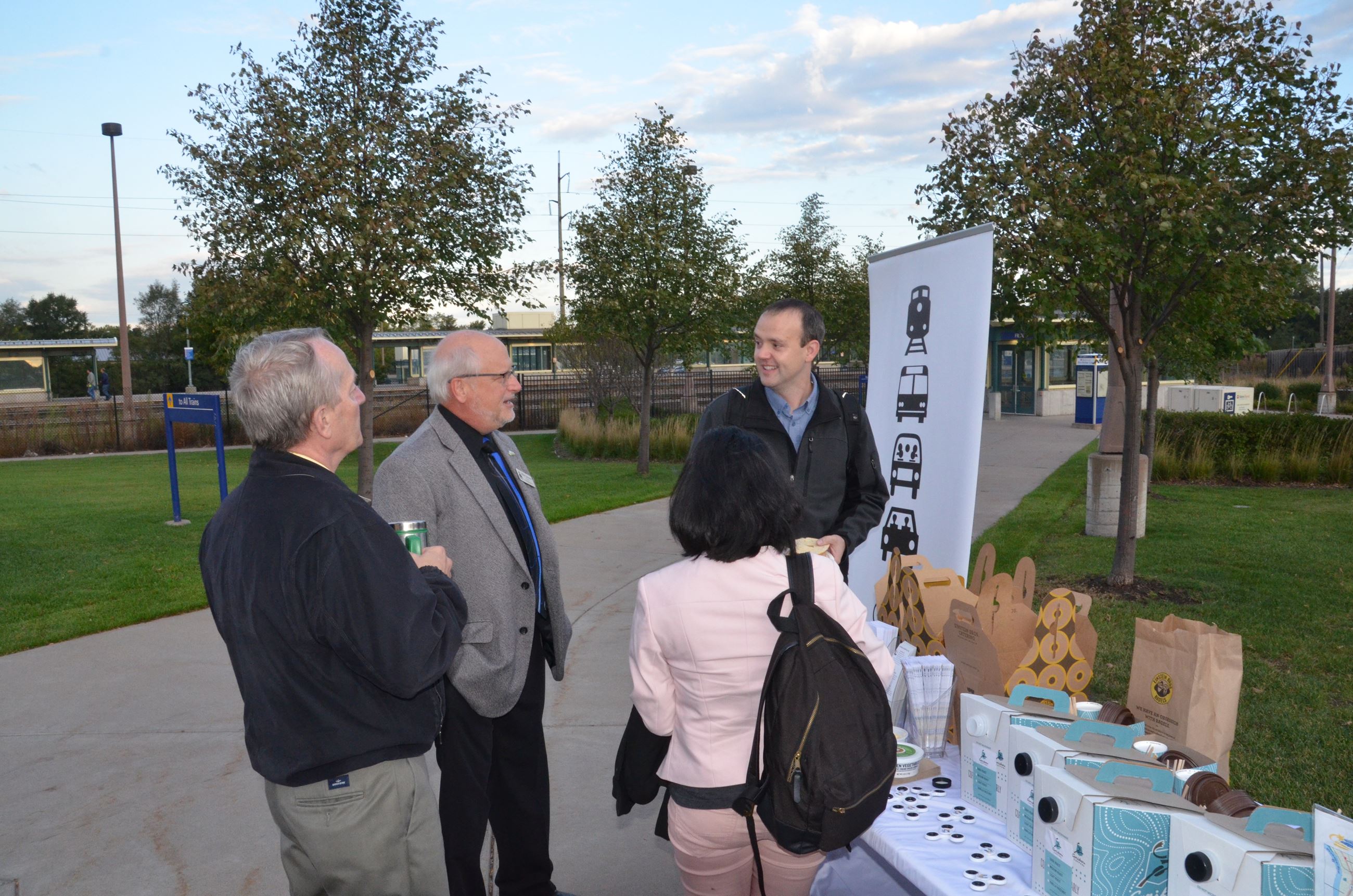 Shuttle riders stopped by the event on their way to work