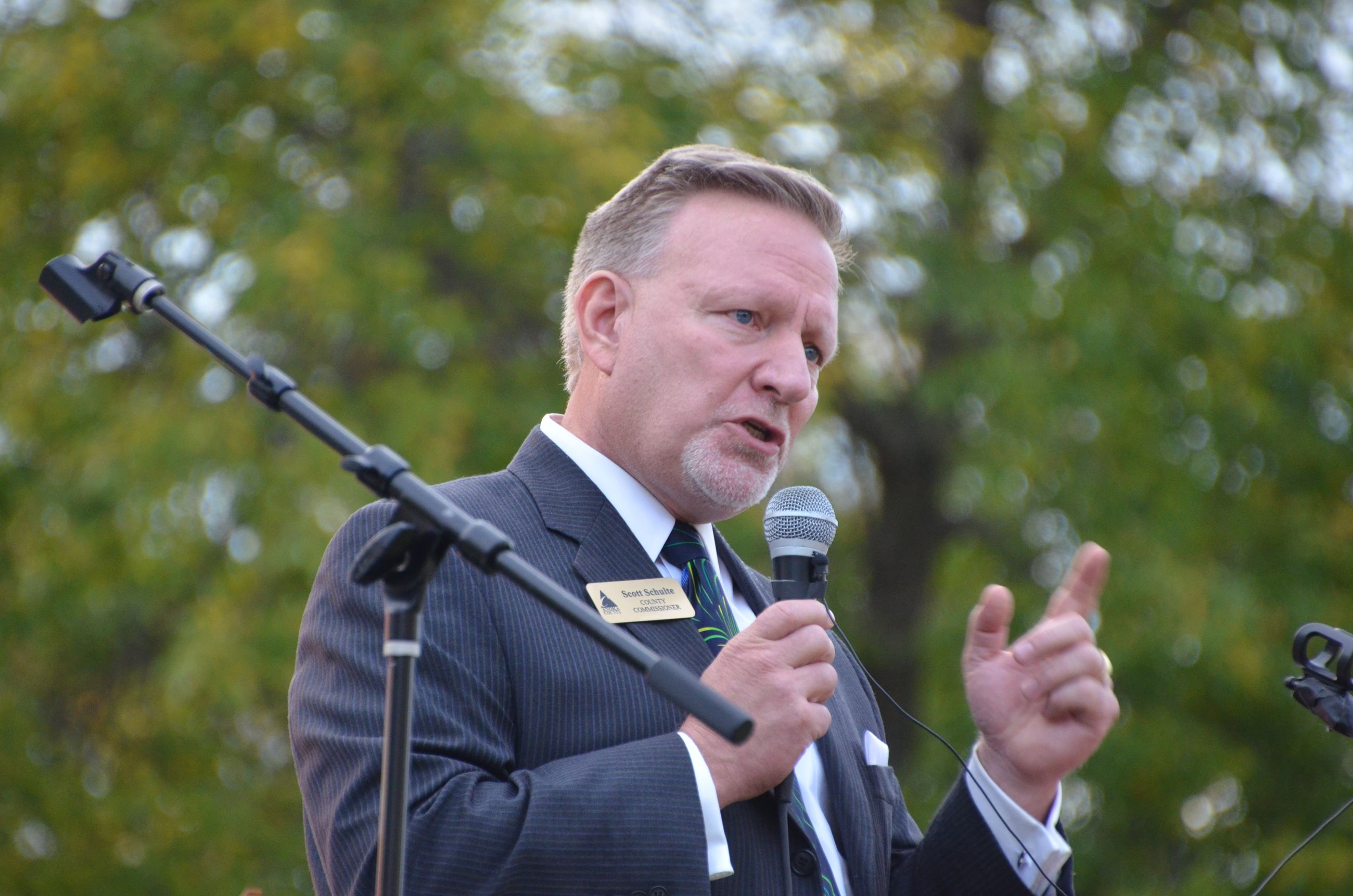 Commissioner Schulte speaking at the event