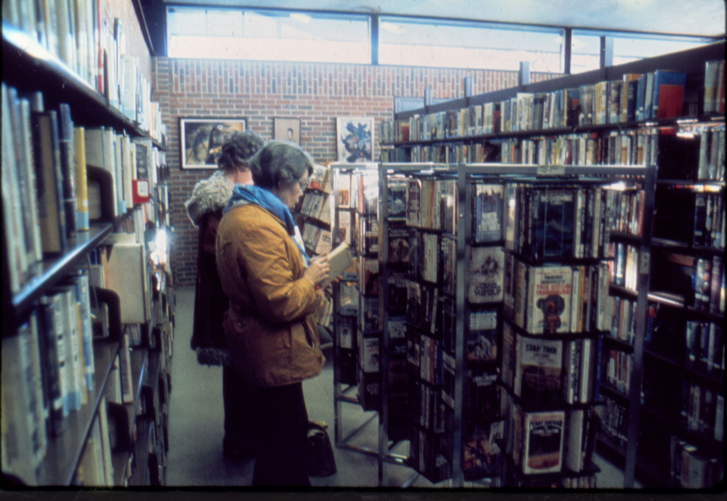 Patrons Looking at Books, Northtown Library, Blaine, 1982