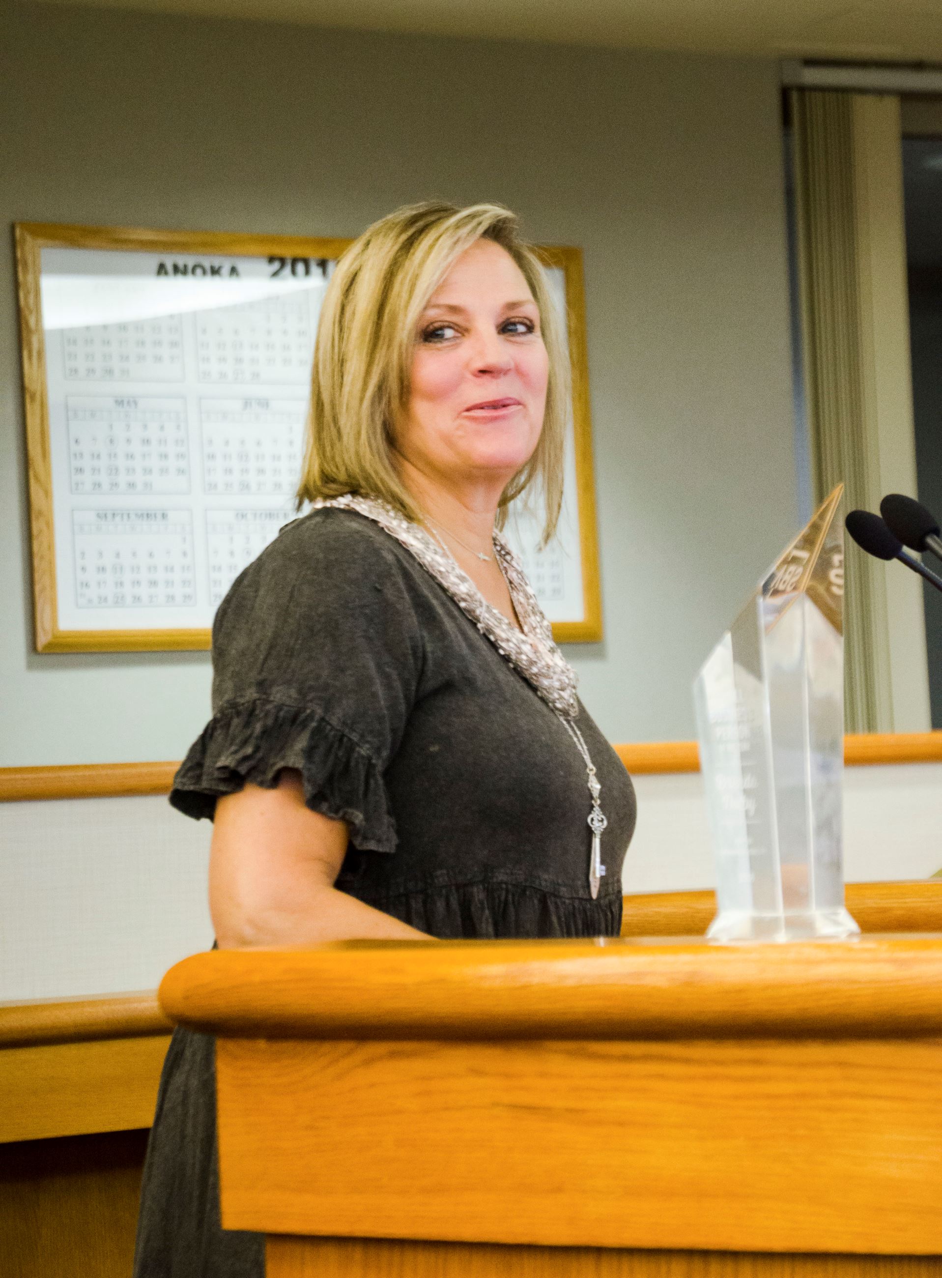 Small Business Owner of the Year Brenda Nolby addresses the board