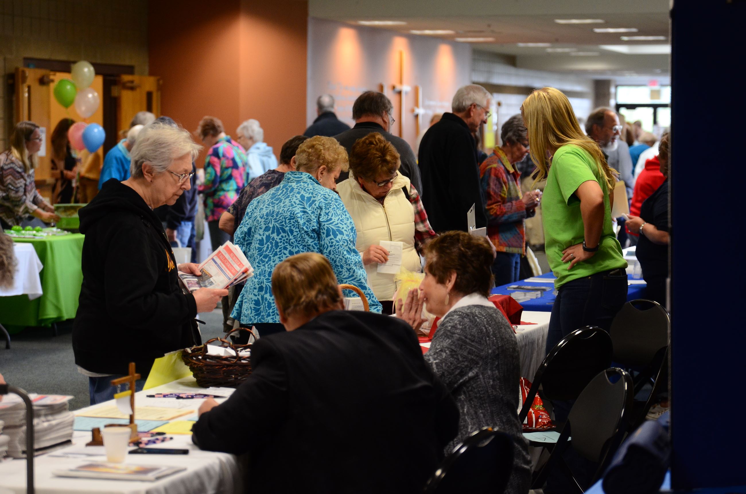 Visitors view displays at the Senior Expo