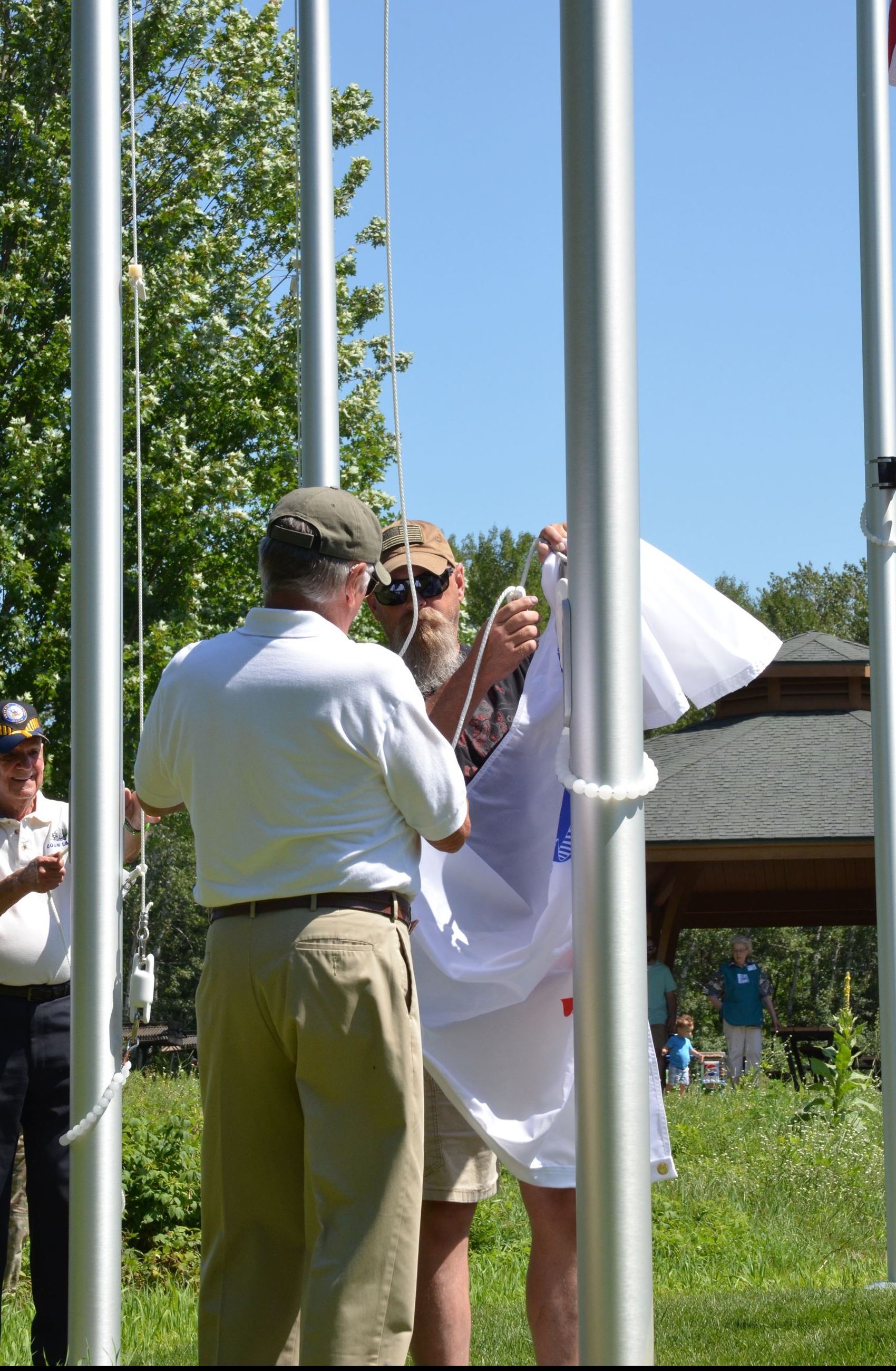 Veterans raise the flag