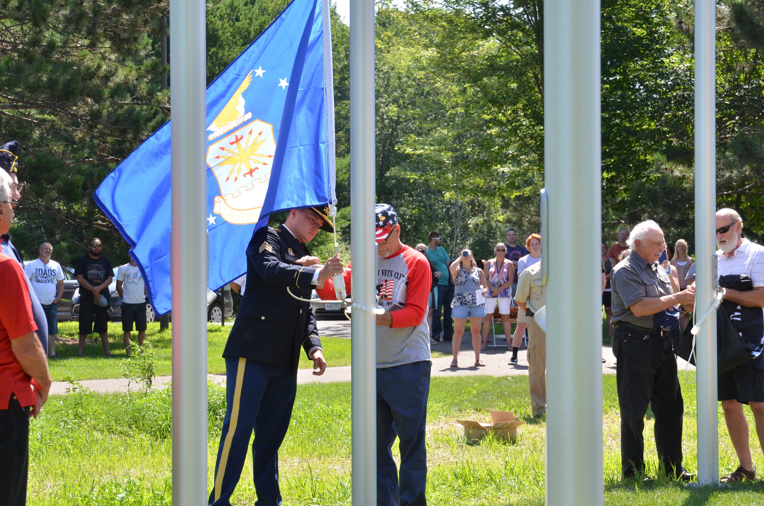 Veterans raise the flag